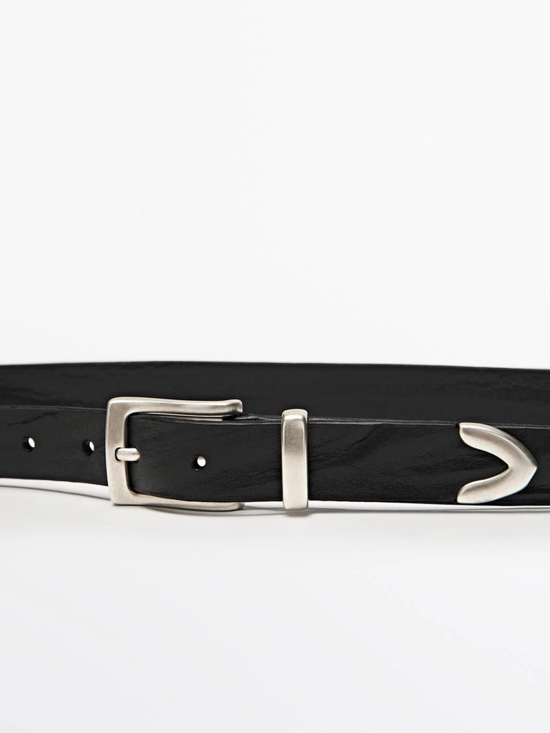 Кожанный ремень с деталями на наконечнике