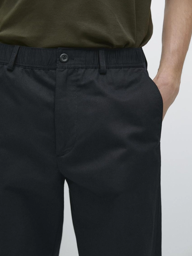 Хлопковые брюки в стиле джоггер из смесового материала