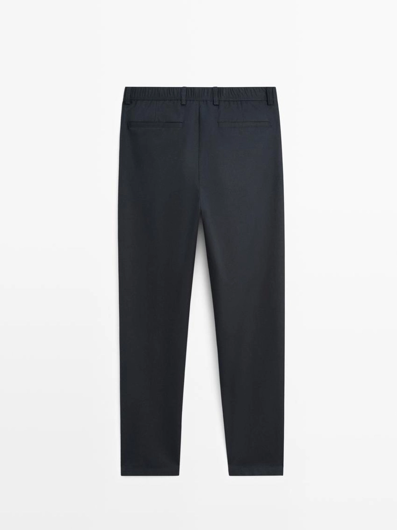 Хлопковые брюки в стиле джоггер из смесового материала