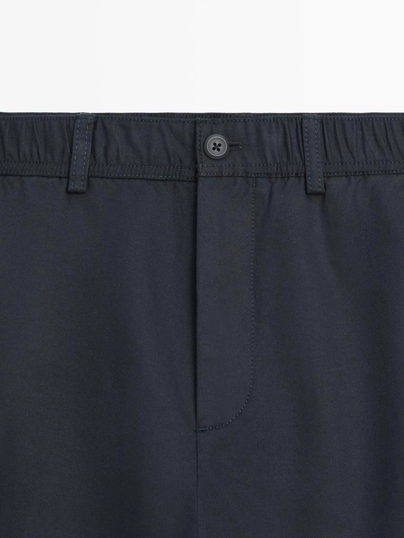 Хлопковые брюки в стиле джоггер из смесового материала