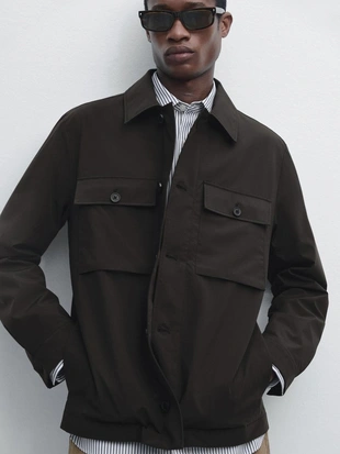 Короткая куртка с деталями карманов- Заказать в России