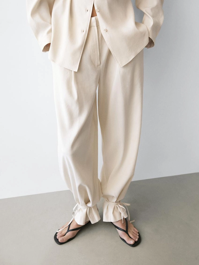 Брюки свободного кроя с завышенной талией