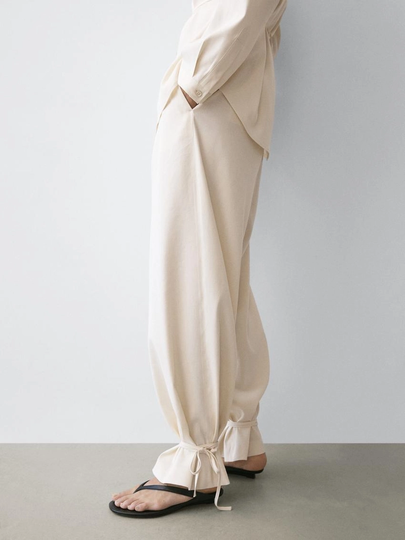 Брюки свободного кроя с завышенной талией