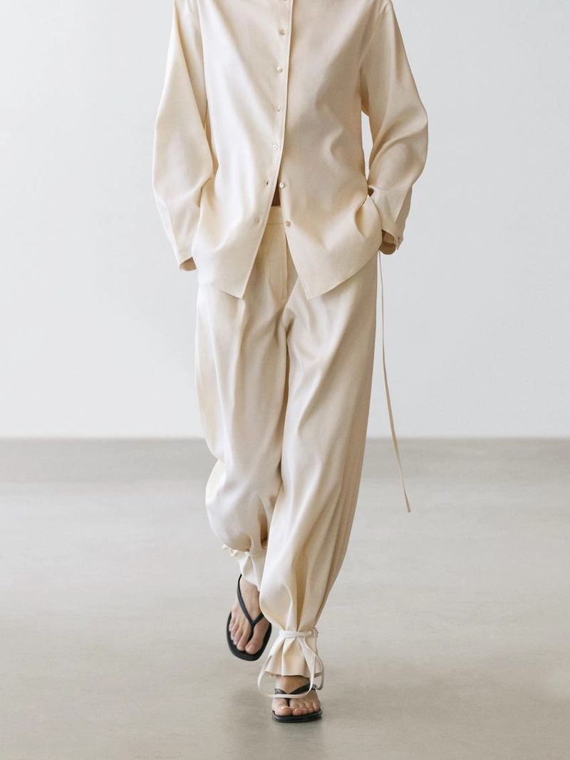 Брюки свободного кроя с завышенной талией