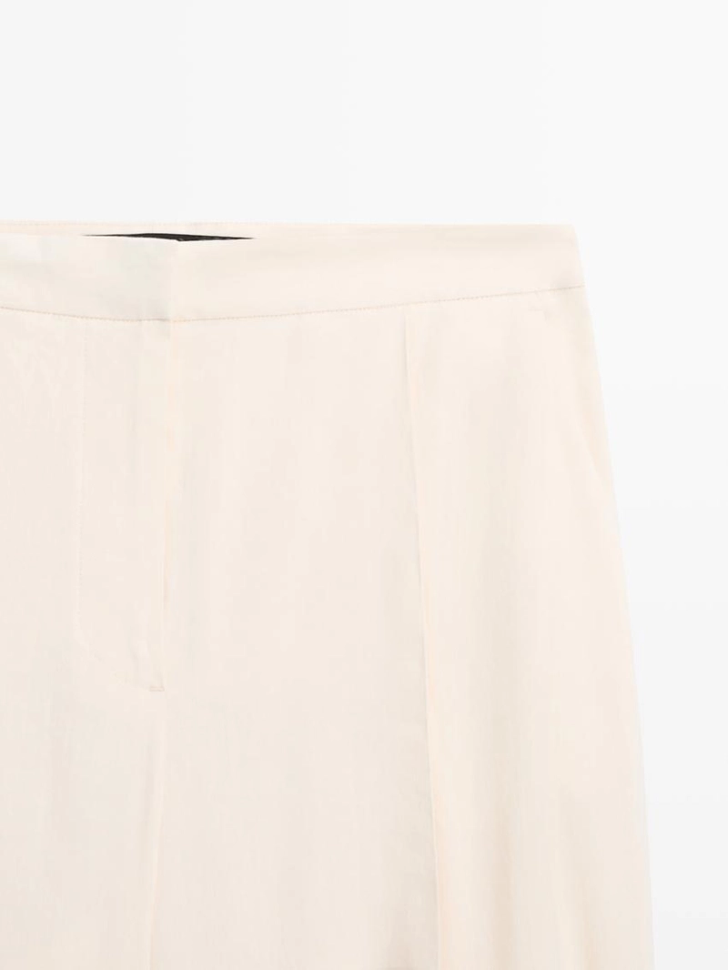 Брюки свободного кроя с завышенной талией