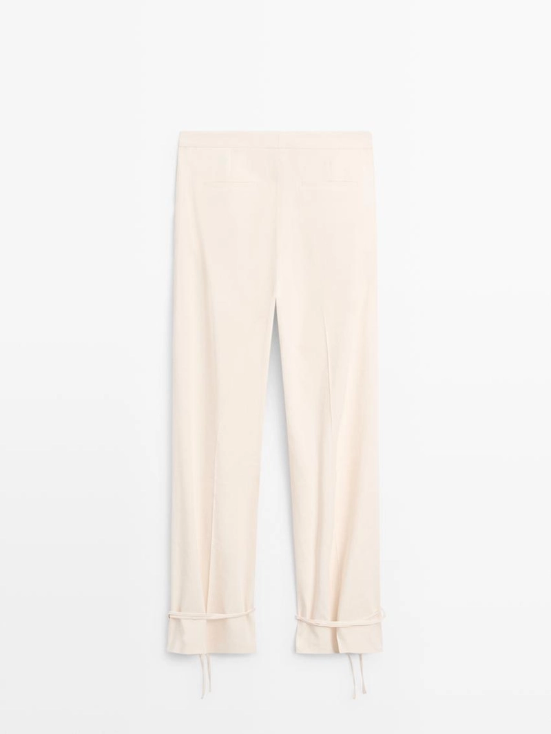 Брюки свободного кроя с завышенной талией