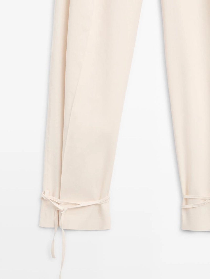 Брюки свободного кроя с завышенной талией