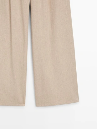 Брюки свободного покроя с высокой посадкой- Заказать в России