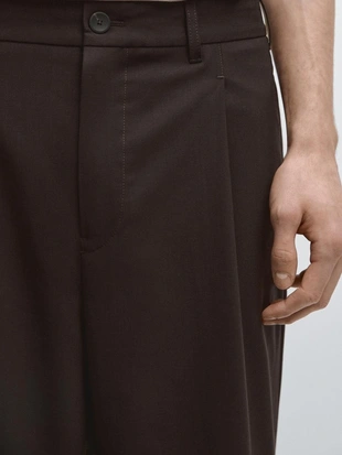 Брюки из шерстяной смеси свободного кроя- Заказать в России