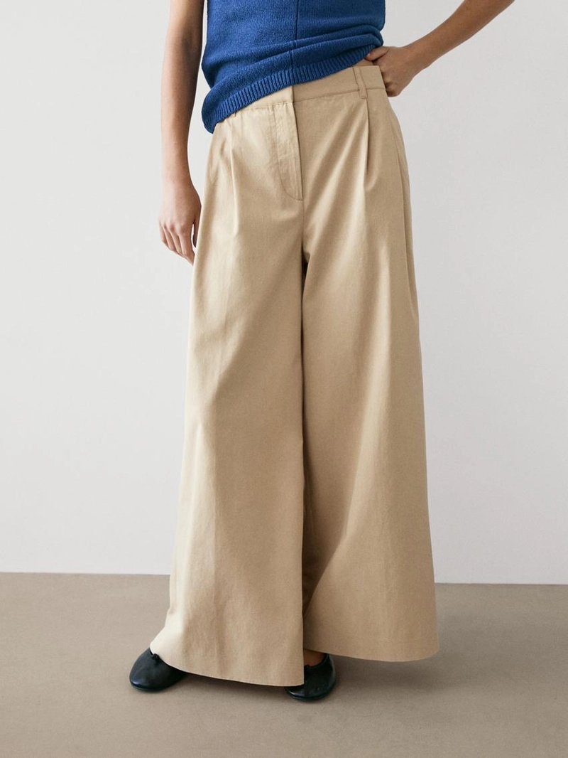 Широкие брюки с защипами