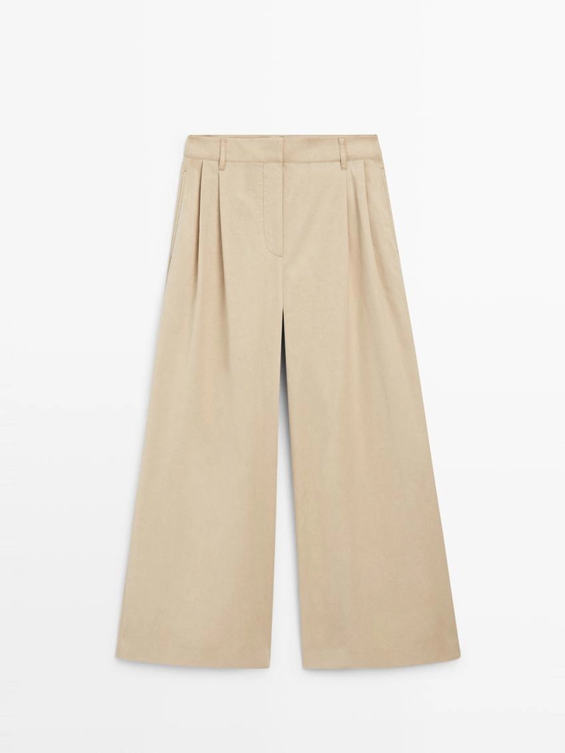 Широкие брюки с защипами