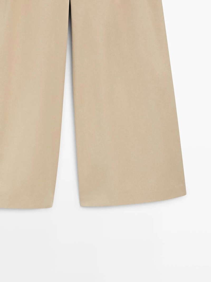 Широкие брюки с защипами