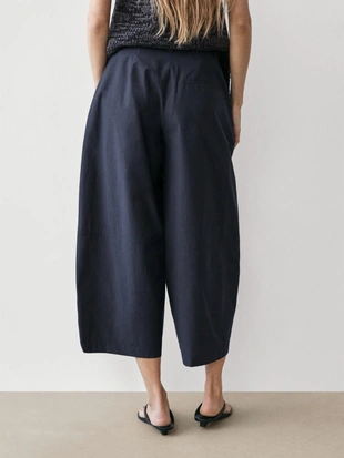 Брюки из хлопкового смесового материала широкого покроя- Заказать в России