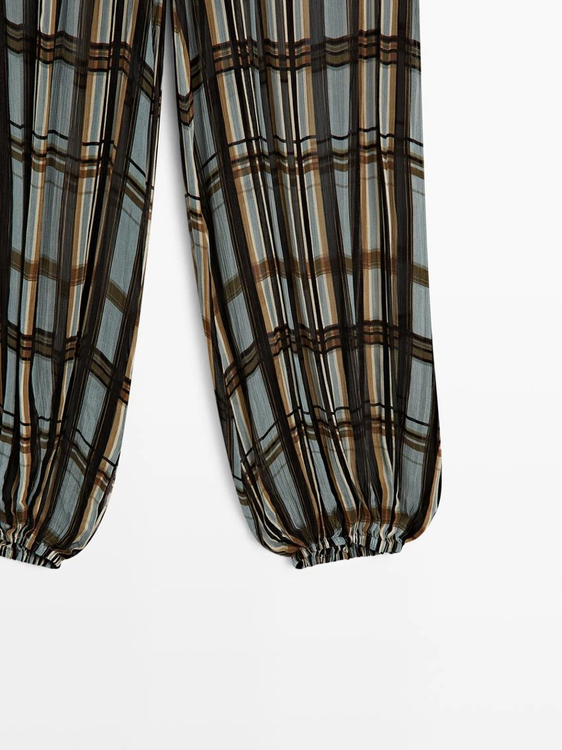 Брюки-саруэль в клетку с легкими штрихами