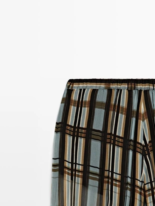 Брюки-саруэль в клетку с легкими штрихами- Заказать в России