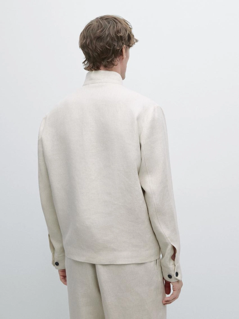 Короткий льняной пиджак с вставкой из штаниной