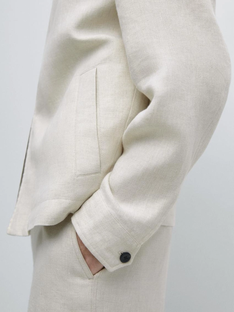 Короткий льняной пиджак с вставкой из штаниной