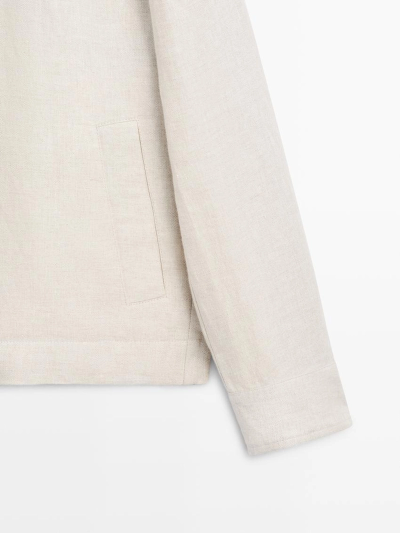 Короткий льняной пиджак с вставкой из штаниной