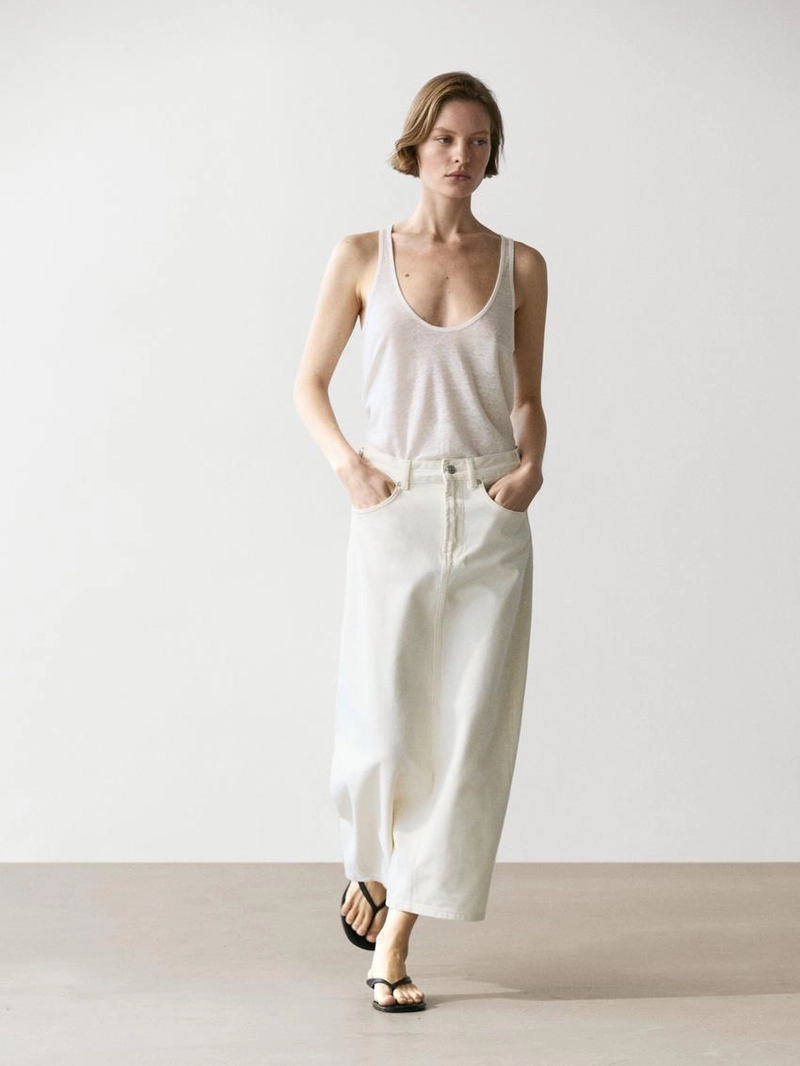 Джинсовая юбка миди силуэта бочонок