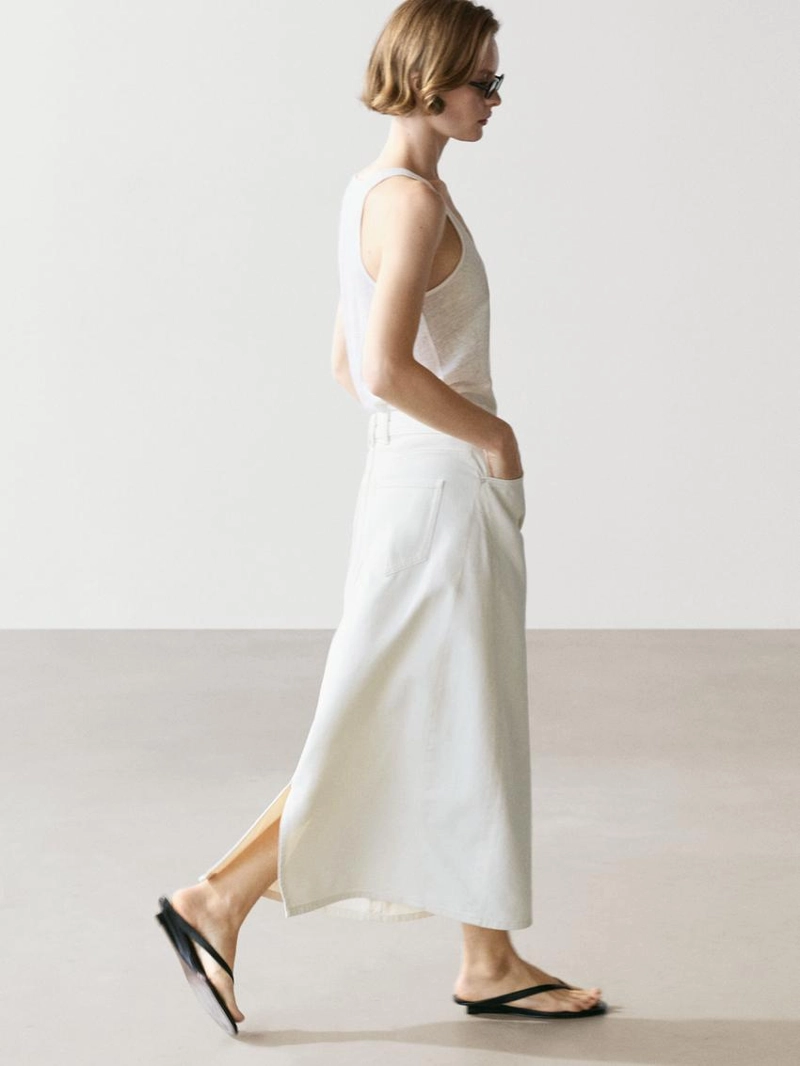 Джинсовая юбка миди силуэта бочонок