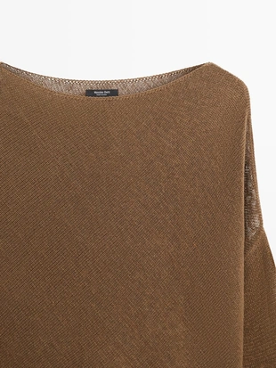 Кофта-пончо с ассиметричным вязаным узором- Заказать в России