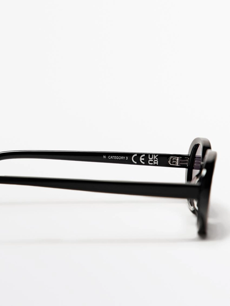 Солнечные очки в миниатюрном овальном дизайне