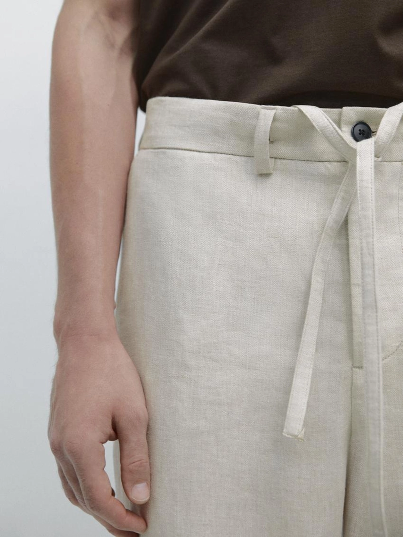 Легкие льняные брюки с вставкой из рыбьего узора