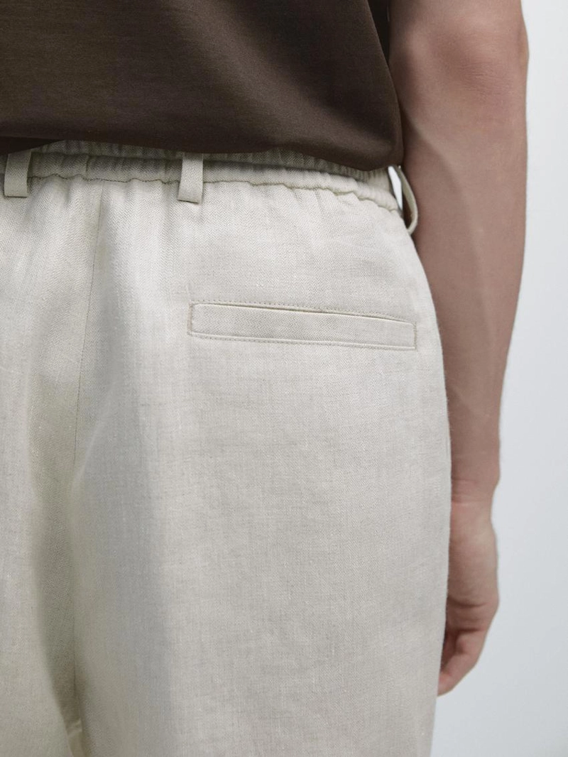 Легкие льняные брюки с вставкой из рыбьего узора