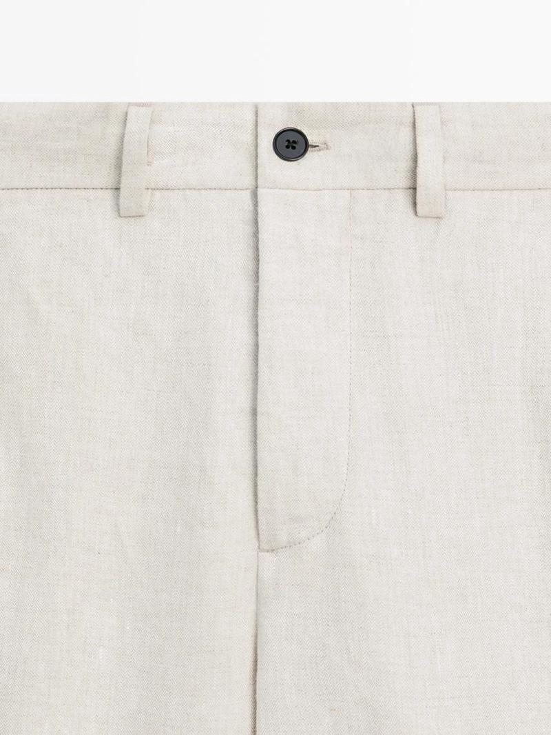 Легкие льняные брюки с вставкой из рыбьего узора