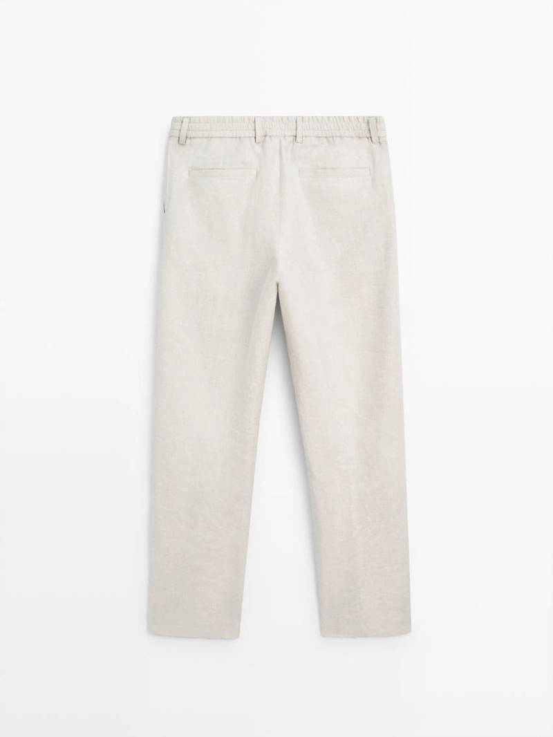 Легкие льняные брюки с вставкой из рыбьего узора