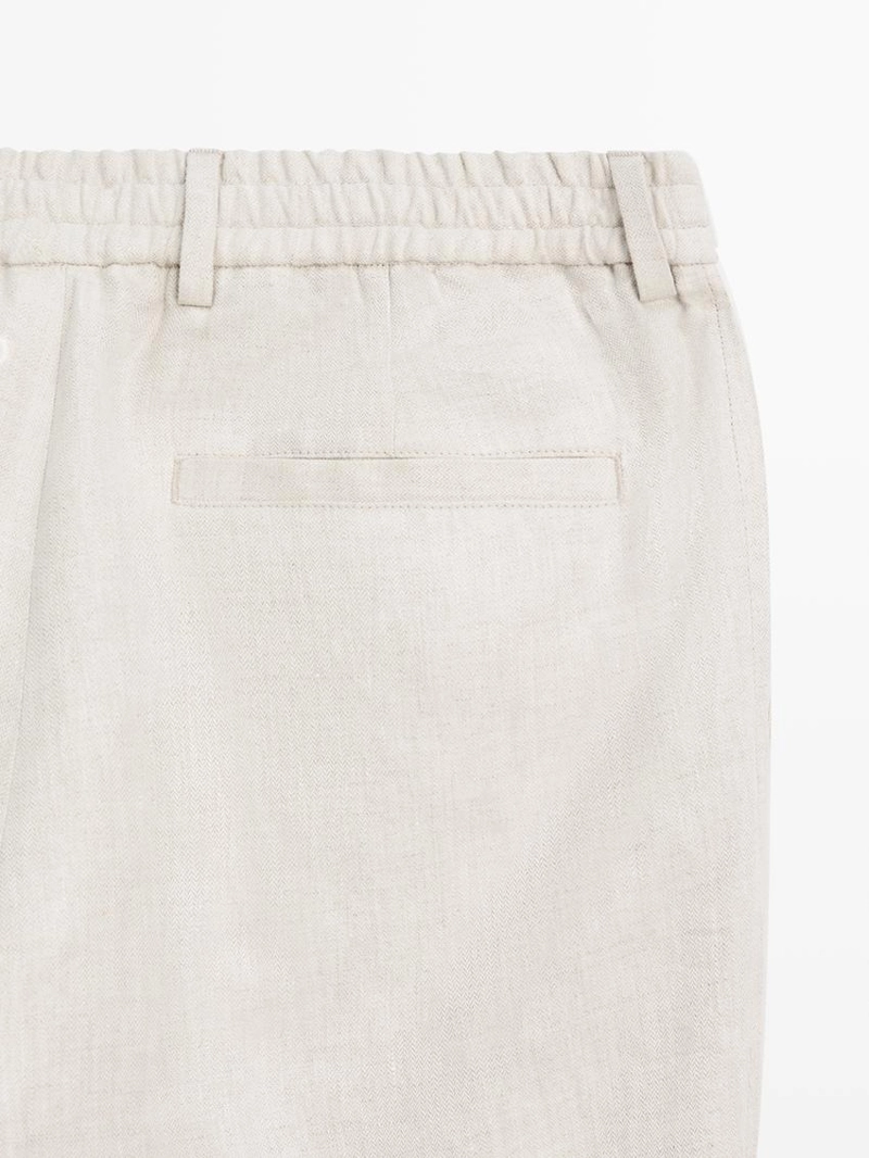 Легкие льняные брюки с вставкой из рыбьего узора