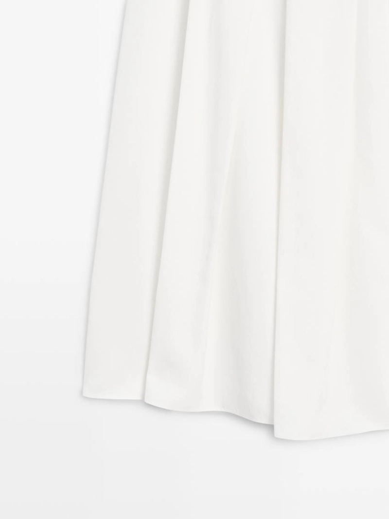 Юбка миди с объемными складками