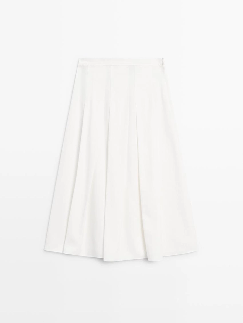 Юбка миди с объемными складками