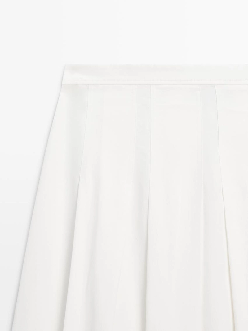 Юбка миди с объемными складками