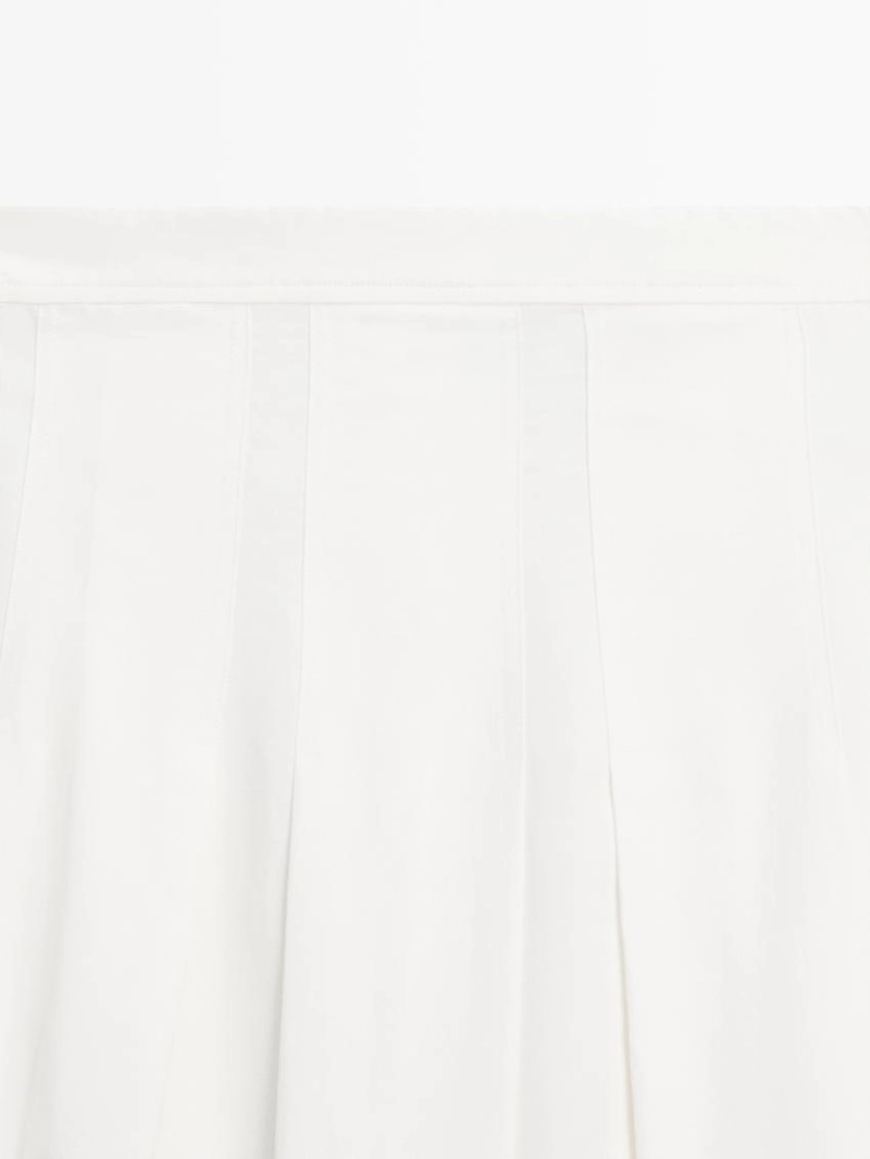 Юбка миди с объемными складками