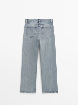 Джинсы с широкими штанинами на средней талии- Заказать в России