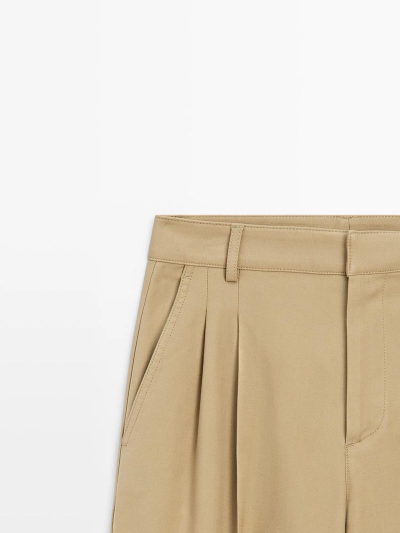 Брюки прямого кроя с защипами