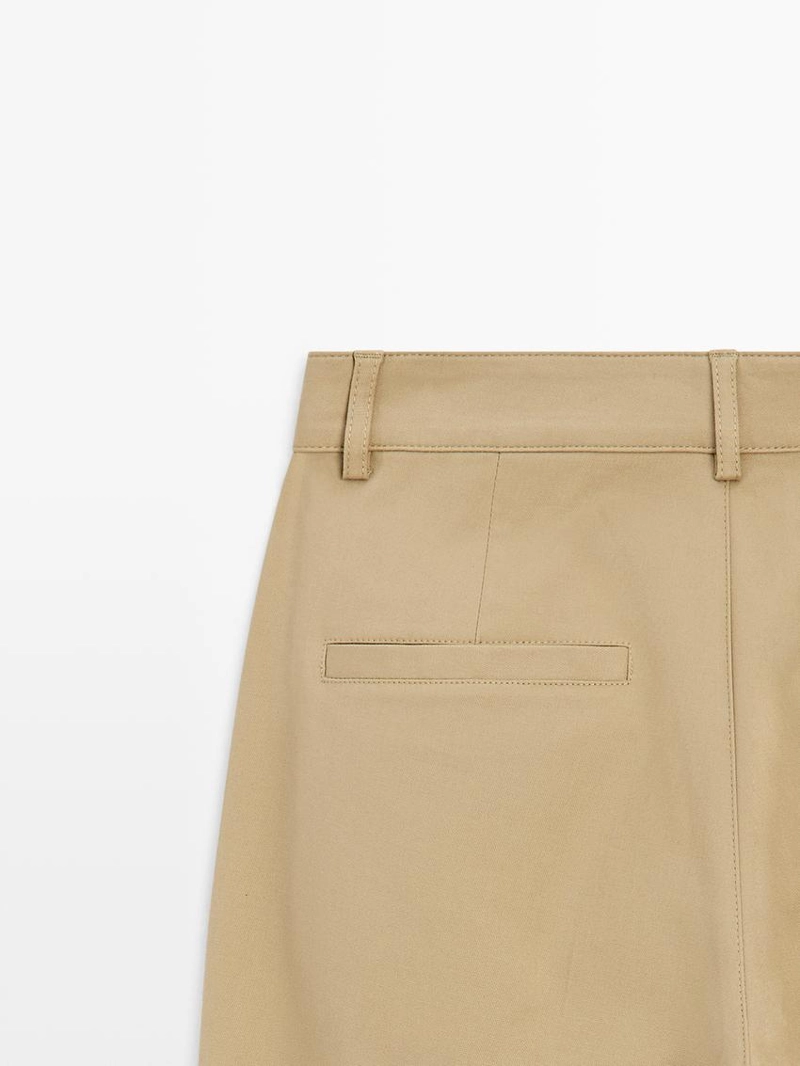 Брюки прямого кроя с защипами