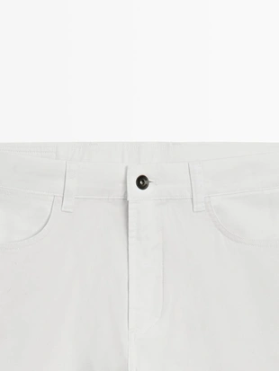 Брюки с эффектом денима и зауженным кроем- Заказать в России