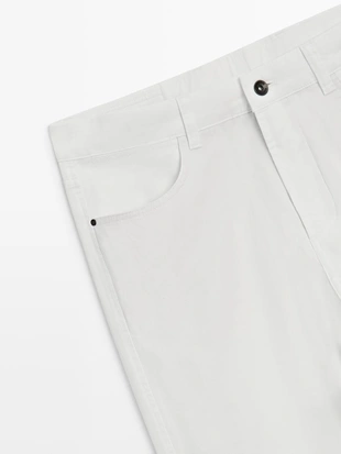 Брюки с эффектом денима и зауженным кроем- Заказать в России