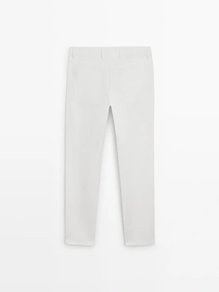 Брюки с эффектом денима и зауженным кроем- Заказать в России