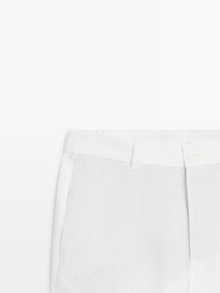 Брюки из льна с зауженным кроем- Заказать в России