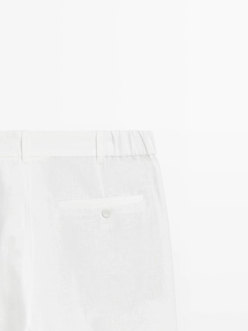 Брюки из льна с зауженным кроем