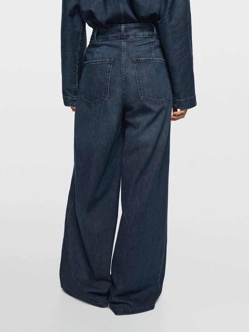 Джинсы с высокой посадкой и широкими штанинами