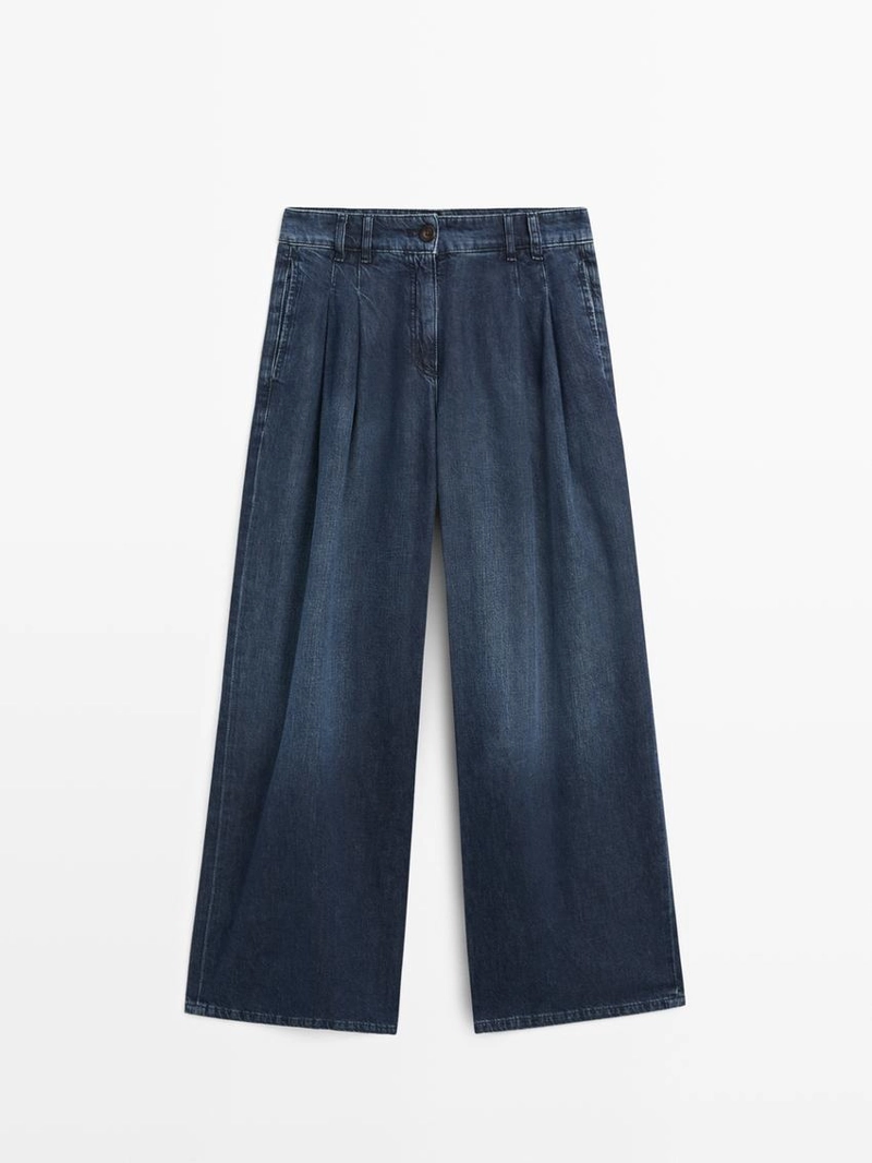 Джинсы с высокой посадкой и широкими штанинами