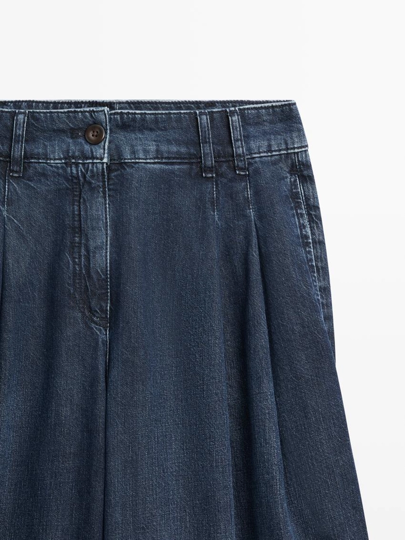 Джинсы с высокой посадкой и широкими штанинами