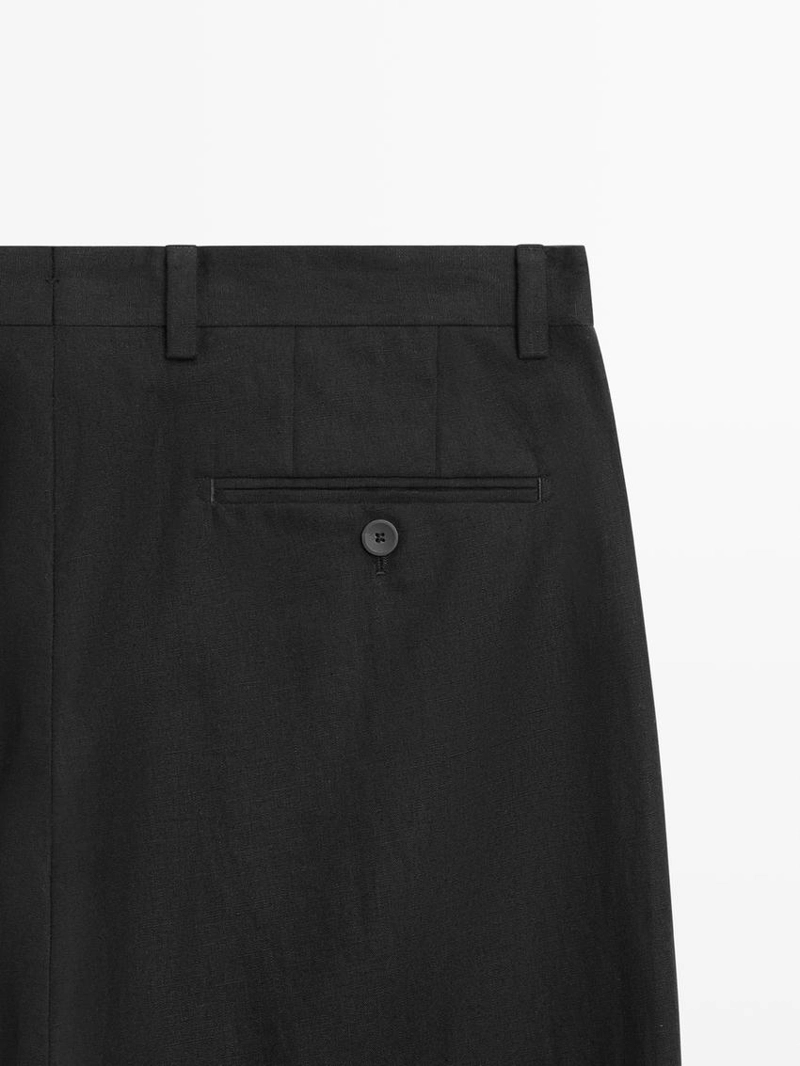 Льняные зауженные брюки приталенного кроя