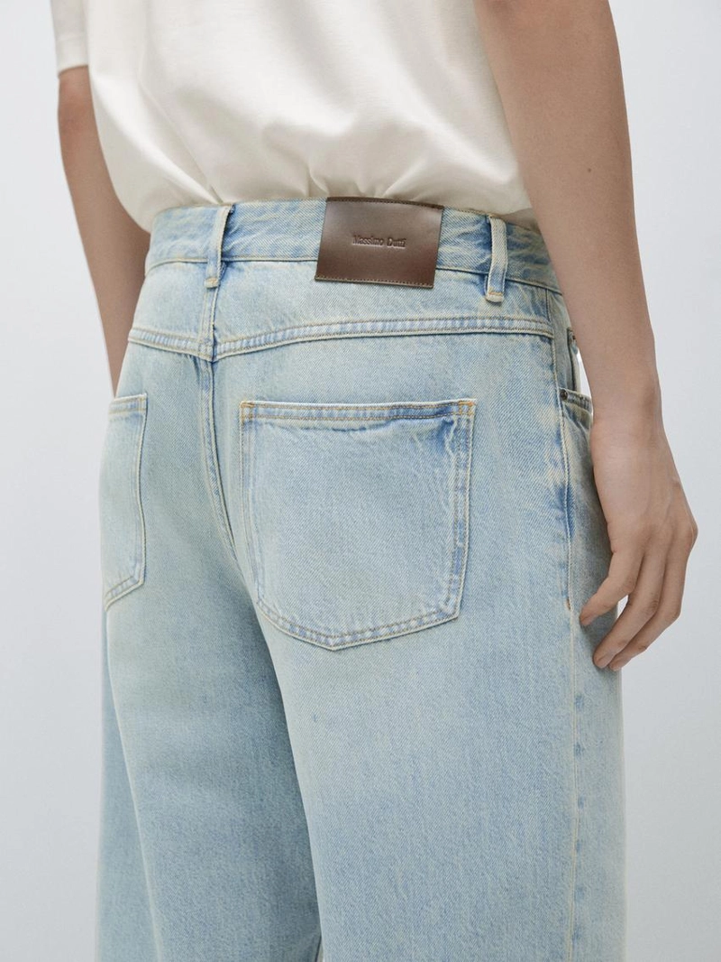 Джинсы с широкими штанинами