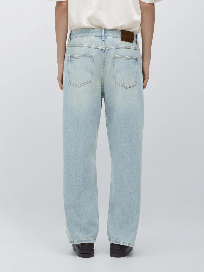 Джинсы с широкими штанинами