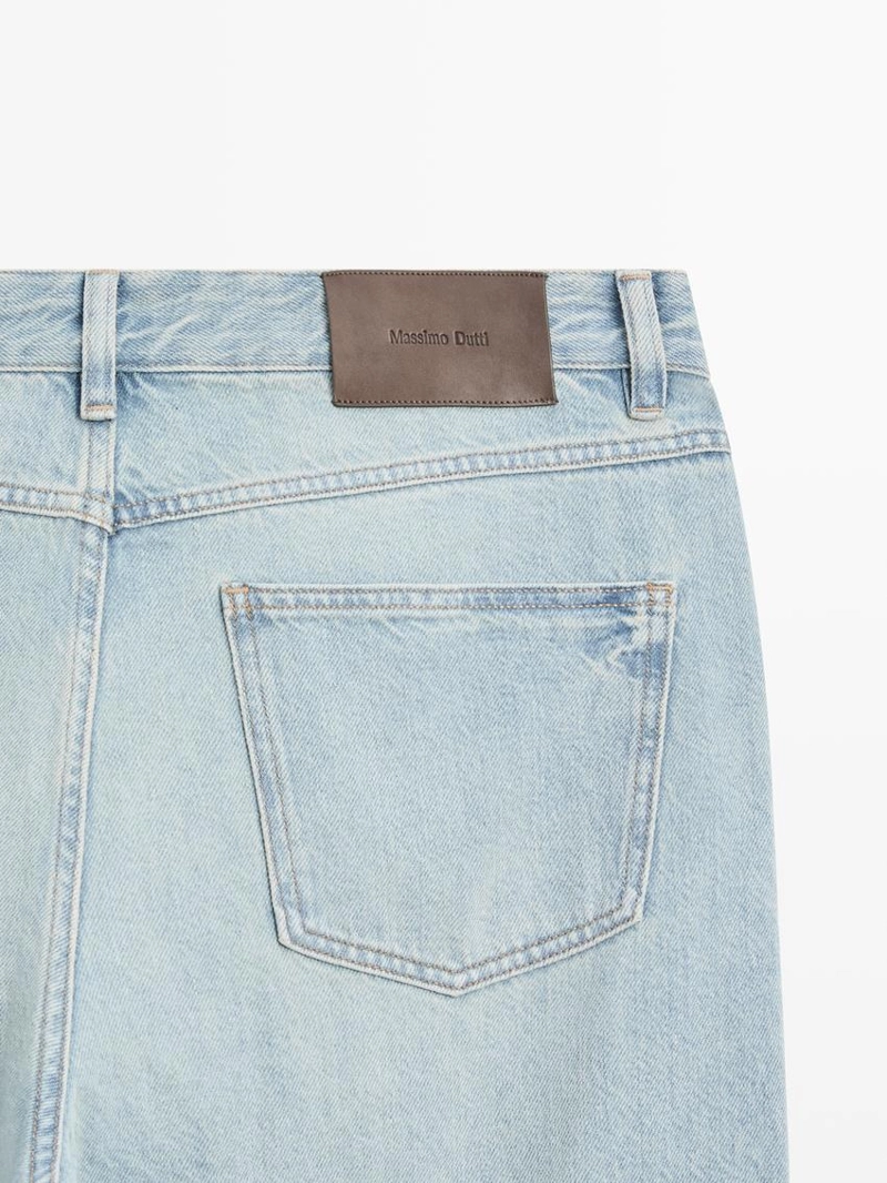 Джинсы с широкими штанинами